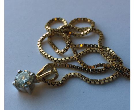 DIAMOND SOLITAIRE PENDANT set with a brilliant cut diamond of approximately 0.39 carats, unmarked, on a nine carat gold chain