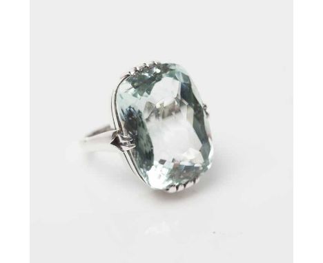 IMPRESSIVE AQUAMARINE DRESS RING
the cushion cut stone approximately 38 carats, set in silver, size M 