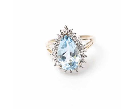 AQUAMARINE AND DIAMOND CLUSTER RING
with a central pear shaped aquamarine, surrounded by brilliant diamonds, in nine carat ye