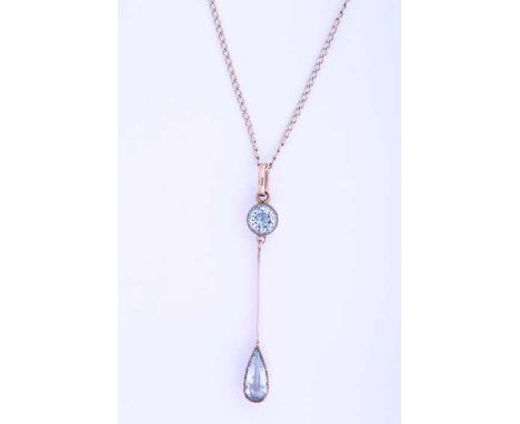 AQUAMARINE PENDANT
with a pear shaped aquamarine drop below a round aquamarine, in nine carat gold, on a chain
