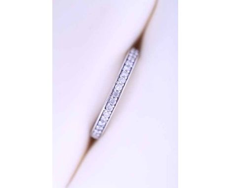 DIAMOND HALF ETERNITY RING
channel set with brilliant cut diamonds, in nine carat white gold, size L-M