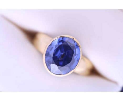 TANZANITE RING
set with an oval tanzanite of approximately 5.94 carats, in eighteen carat gold, size O