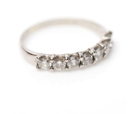 DIAMOND HALF ETERNITY RING
set with a row of seven brilliant cut diamonds, size R