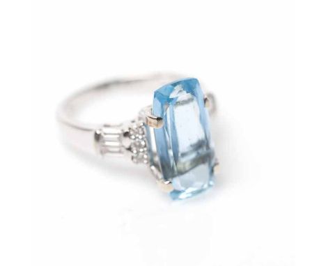 AQUAMARINE AND DIAMOND DRESS RING
the large rectangular aquamarine approximately 4.95 carats, on brilliant and baguette cut d