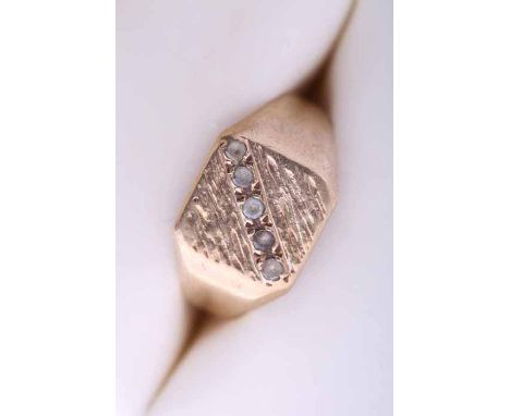 NINE CARAT GOLD GENTLEMAN'S SIGNET RING
set with a row of white stones, hallmarked nine carat gold, size Q-R, 4.8gms