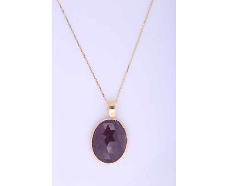 LARGE UNTREATED RUBY PENDANT
the faceted untreated and unheated oval ruby measuring approximately 24.carats, in eighteen cara