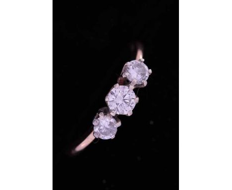 DIAMOND THREE STONE RING
the brilliant cut diamonds totalling approximately 0.75 carats, unmarked, size M