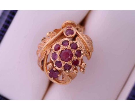 UNUSUAL RUBY CLUSTER RING
the foliate setting with twelve brilliant cut rubies, in twenty two carat yellow gold, size M