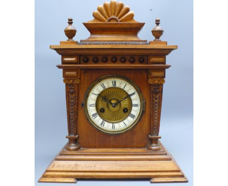 Victorian oak Architectural mantle clock with circular dial, twin train German HAC movement striking the half hours on a coil