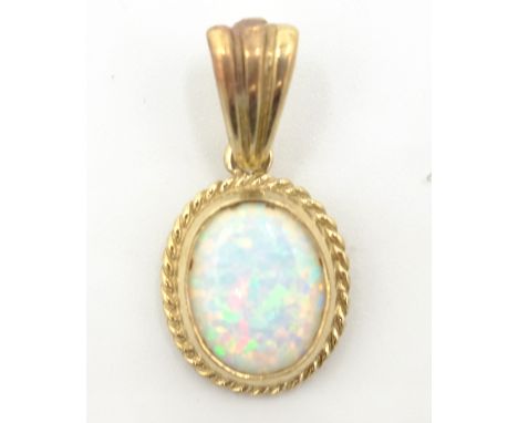 9ct gold opal pendant    Condition Report   Click here for further images, condition, auction times & delivery costs