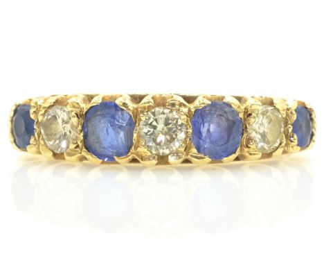 Seven stone sapphire and diamond ring hallmarked 9ct   Condition Report  approx 2.3gm size N-O Click here for further images,