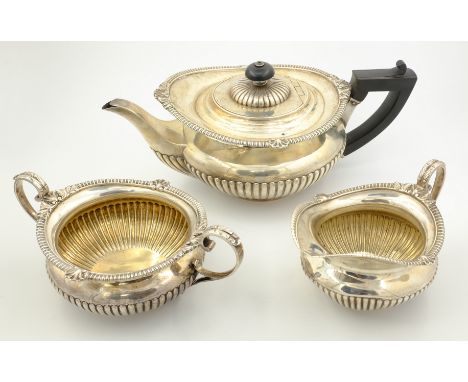 Victorian three piece silver tea service by Alfred Benson & Henry Hugh Webb London 1890, the base of teapot engraved Hunt & R