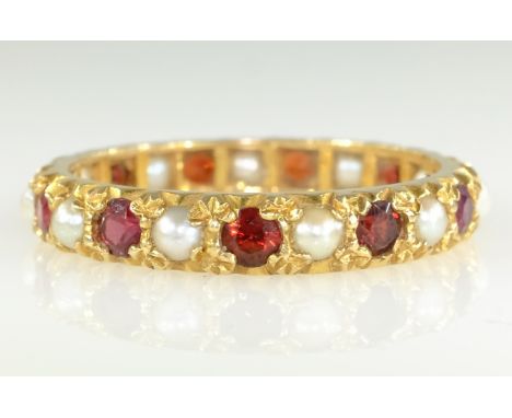 Garnet and seed pearl eternity ring hallmarked 9ct   Condition Report  approx 2.4gm size P Click here for further images, con