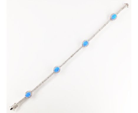 Blue opal and stone set silver bracelet stamped 925   Condition Report   Click here for further images, condition, auction ti