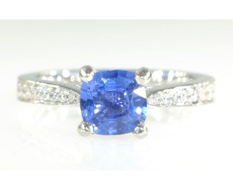Platinum cushion cut sapphire and round brilliant diamond shoulder ring sapphire approx 1 carat   Condition Report  size K-L 