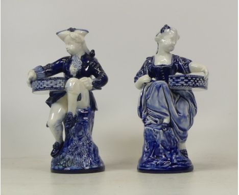 A Pair of Mintons Sweetmeat Dishes in the form of a girl and boy in 18th century dress. Height: 19cm (2)