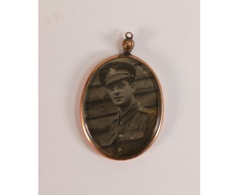 9ct rose gold oval double sided portrait locket.