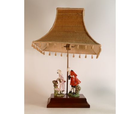A pair of Royal Doulton figures Masquerade HN600 attached to wooden lamp base with shade. Height of figure 17.5cm