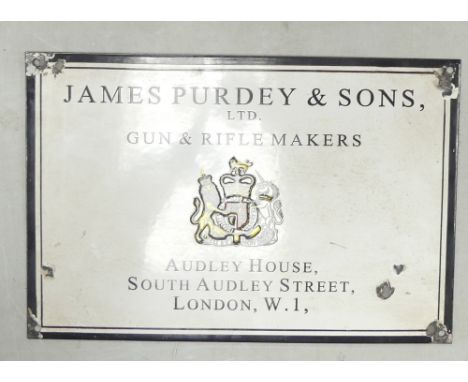 A rectangular enamel advertising sign,James Purdey &amp; Sons Ltd Gun and Rifle makers, 38 x 25cm.