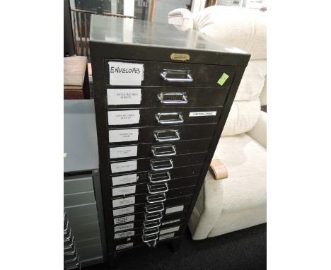 A set of vintage filing drawers, labelled Baker's