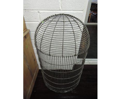 A vintage wire work part birdcage