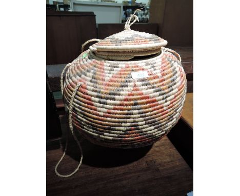 A vintage Oriental style basket