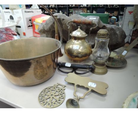 A selection of brass wares including chamber stick, hunting horn etc