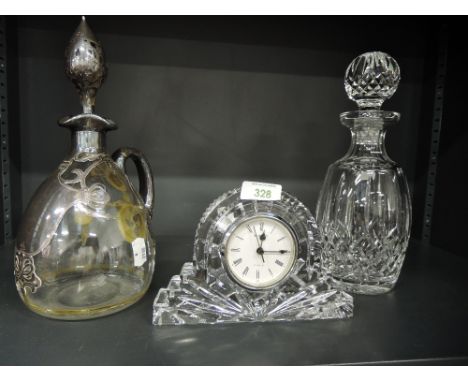 A selection of clea cut and crystal glass wares including Waterford mantle clock