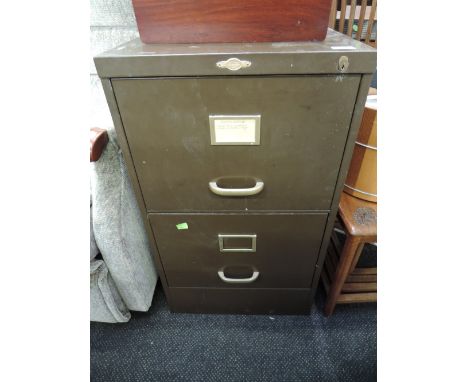 A vintage metal filing cabinet