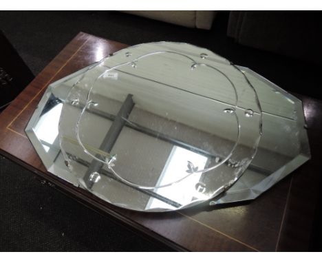 Two vintage frameless wall mirrors