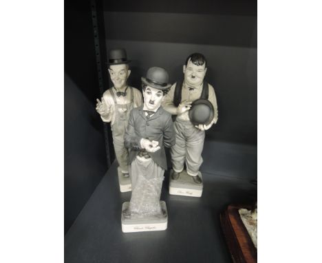 Three Algora Personajes Del Cine limited edition figures, Charlie Chaplin, Stan Laurel and Oliver HardyCONDITION REPORTOliver