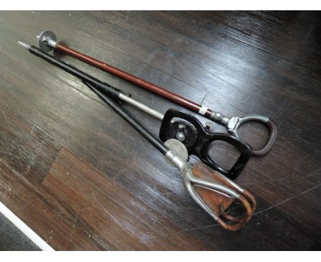 A selection of shooting and hunting sticks including Mills Munitions