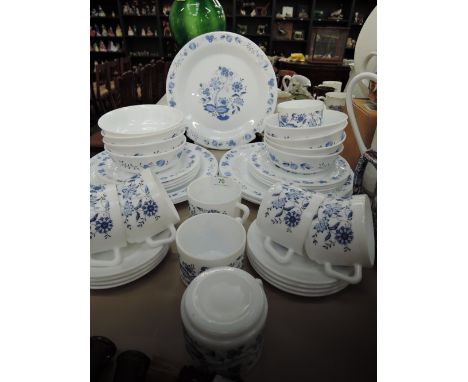 A part tea deinner service in pressed glass by Arcopal France