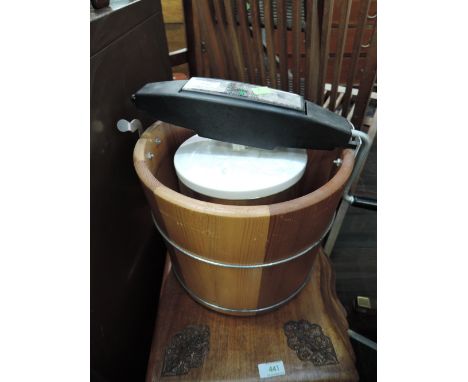 A vintage Sears home made ice cream maker