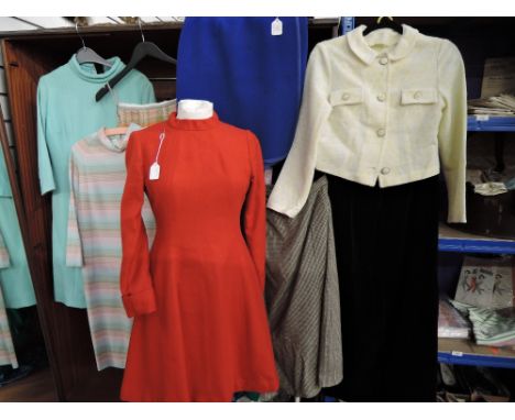 Eight vintage items of clothing, mostly 1960s in a variety of styles and fabrics, some damage and age related wear to some it
