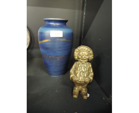 A vintage brass cast money box figure in a Robertsons jam style and Jeff Banks vase