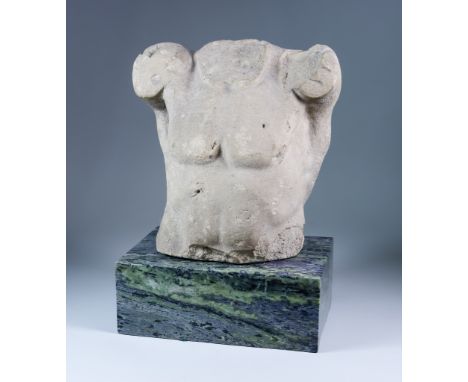 A Carved Limestone Male Torso, possibly medieval, 10.5ins high, on polished veined marble base, 14ins high overallCondition R