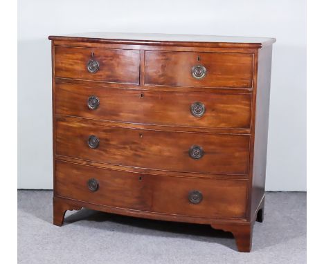 A George III Mahogany Bow Front Chest, with moulded edge to top, fitted two short and three long drawers, on bracket feet, 42