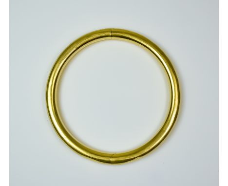 A Gold Stiff Bangle, Early 20th Century, 18ct gold, internal circumference approximately 175mm, gross weight 17.4g