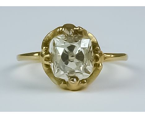 A Solitaire Diamond Ring, Early 20th Century, 18ct yellow gold set with a cushion cut facted diamond, approximately 1ct, size