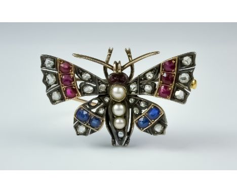 A Diamond, Sapphire and Ruby Brooch, Late 19th/ Early 20th Century, yellow and silver metal set with small diamonds, sapphire