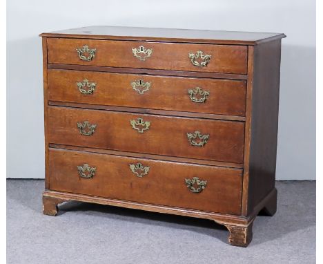 An 18th Century Oak Chest, with moulded edge to top, fitted four long graduated drawers, on bracket feet, 40ins wide x 20ins 