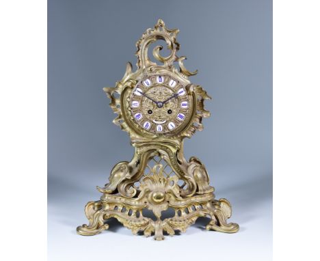 A Late 19th Century French Gilt Brass Mantle Clock, by Rango Freres of Paris, No.2466, the 4.5ins diameter cast brass dial wi