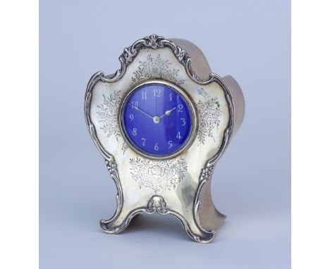 An Edward VII Silver Cased Timepiece of Rococo Design, by William Comyns, London 1902,the 2.25ins blue enamelled dial with wh