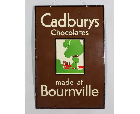 An Early 20th Century Enamelled Rectangular Advertising Sign 'Cadbury's Chocolates Made at Bournville' in brown and white, 24