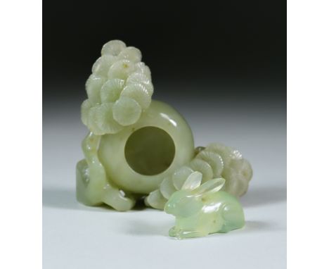 A Chinese Green Jade Brush Washer, carved with flowering branches, 3.75ins (5.5cm) wide, and a Chinese jade rabbit, 1ins (3.1