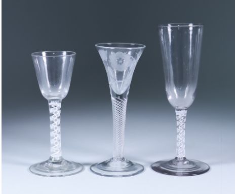 Three Wine Glasses, 18th Century, including - wine glass with engraved trumpet bowl on an opaque twist stem on conical foot, 