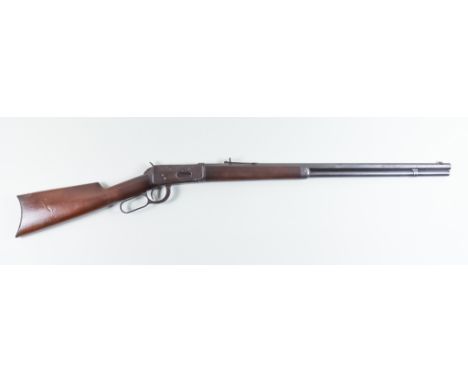 A Winchester Repeating Rifle, model 1894, 32-40 calibre, 25.5ins octagonal barrel, plain steel lock and action, hardwood stoc