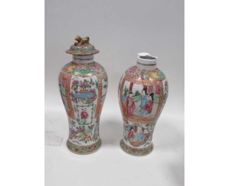 A pair of small Canton vases of baluster form with polychrome decoration (one lid missing)chip and repair to underside of lid