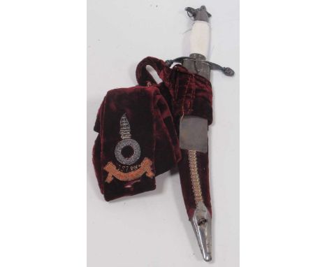 An Indian First Sikh Light Infantry dagger with curved blade and composite hilt